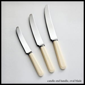 cream handled cutlery candle end handle - oval blade