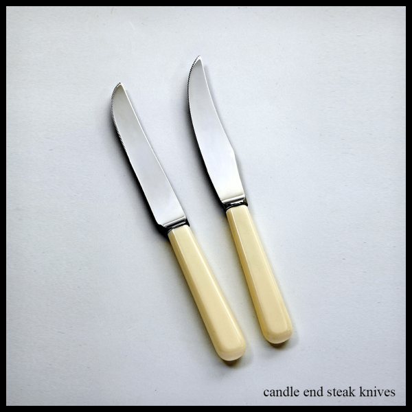 cream handled cutlery candle end steak knives